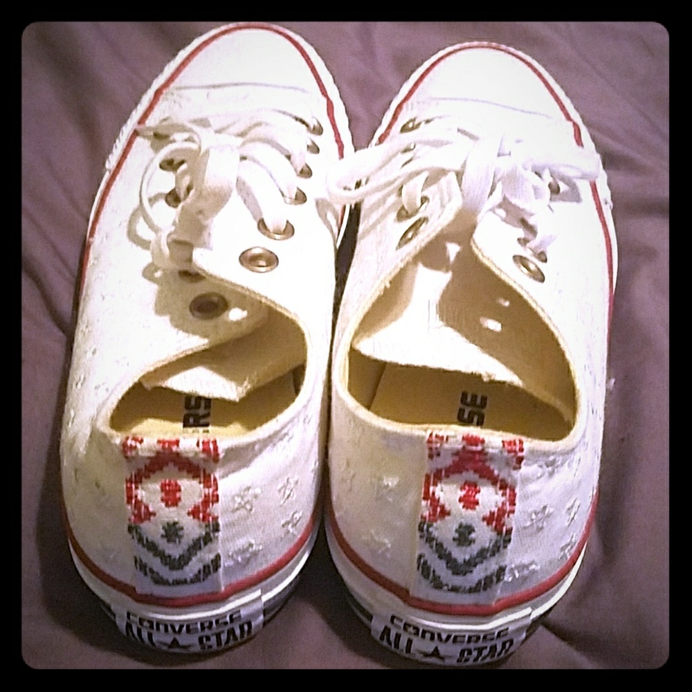 Low type red, white, and blue Converse.